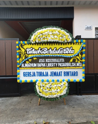 Papan Bunga Duka di Sigando
